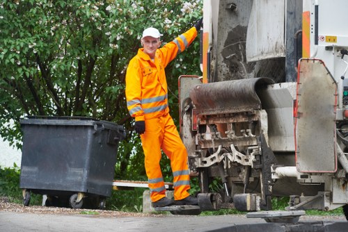 Customer service team assisting with skip hire